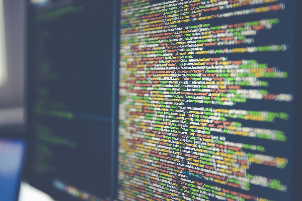 Colorful software or web code on a computer monitor Colorful software or web code on a computer monitor